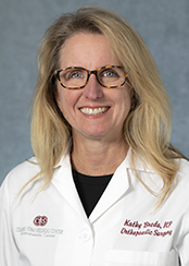 Kathleen M. Breda, NP