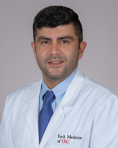 Headshot of Kasra Khatibi