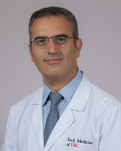 Headshot of Hooman Djaladat