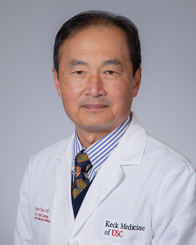 Headshot of John C. Chen