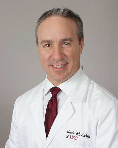 Headshot of Mark J. Spoonamore
