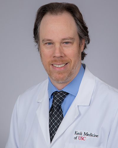 Headshot of Lee Michael Zuckerman