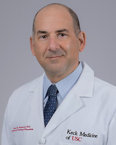 Headshot of Greg R. Angstreich