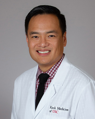 Headshot of Melvin Weiwen Chiu