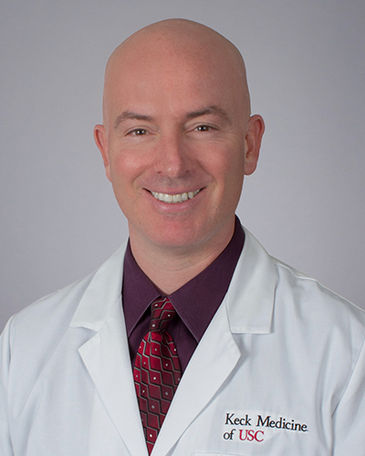 Headshot of Amir Goldkorn