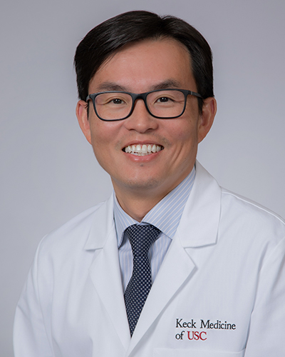 Headshot of Tze-Woei Tan