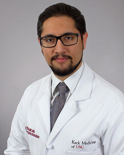 Headshot of Kambiz Etesami