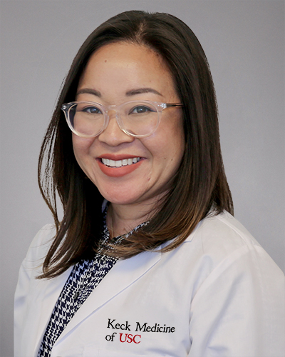 Headshot of Joanne D Suh