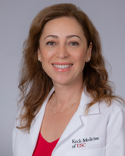 Headshot of Ayarpi Nikolopoulos