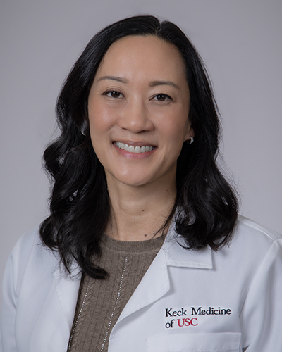 Headshot of Carolyn Wang Kim