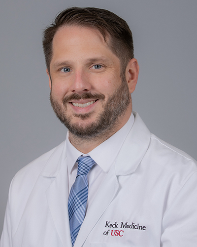 Headshot of Ryan Scoggins