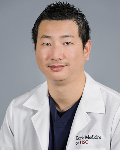 Headshot of Raymond Tran