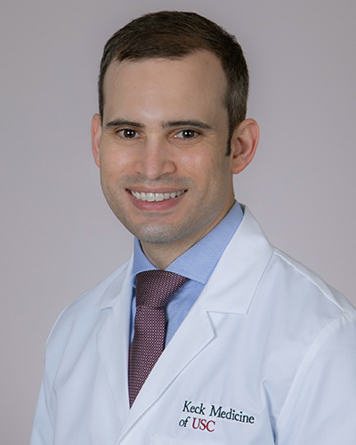 Headshot of Miguel F. Manzur