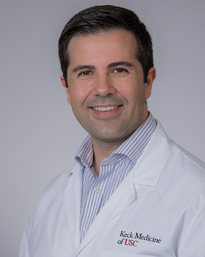 Headshot of Adam Arebi Garsa