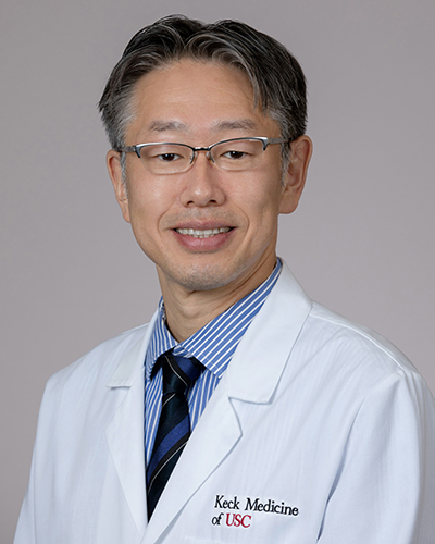 Headshot of Takeshi Saito