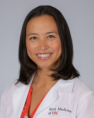 Headshot of April-Joy Millado Spina